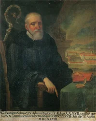 der 37. Abt, Wolfgang Schmid, im Hintergrund eine Ansicht des Klosters St. Georg (Isny)